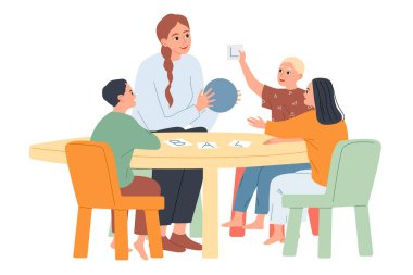 Küçük çocuklar bir anaokulu öğretmeniyle oynar ve öğrenirler.