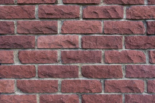 Parede de tijolo texturizado fundo manchado velhos blocos envelhecidos — Fotografia de Stock