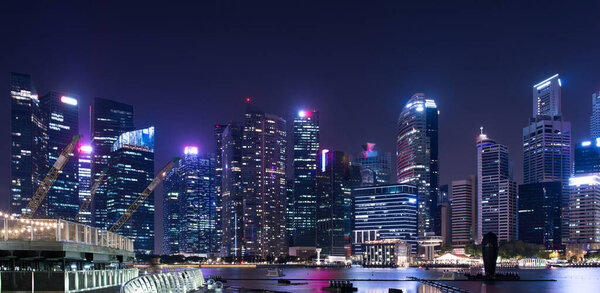 SINGAPORE - February 24, 2019: Cityscape downtown. Night city urban skyline Singapore.