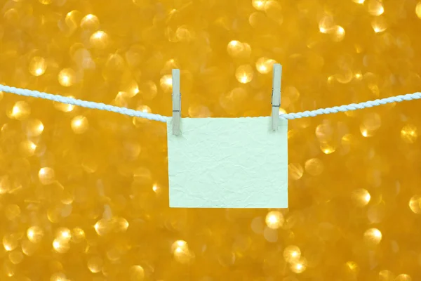 Empty Note Paper Hang Clothesline Gold Bokeh Background Design Your — Stock Photo, Image