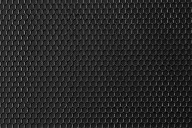 Siyah desenli metalin yüzeyi bir masa arka planıdır.