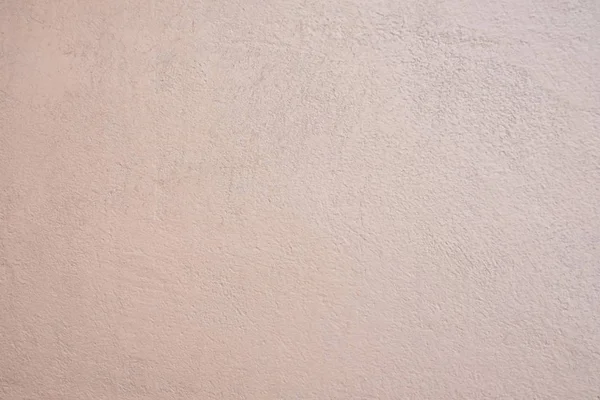 Pomarańczowy brudny cement ściana tło. — Zdjęcie stockowe