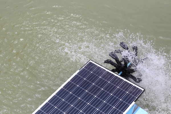 Solar water turbine in the pond.