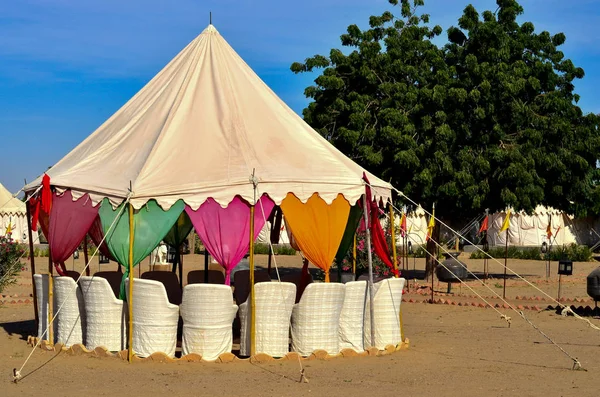 Swiss tents on sand in the Sam sand dunes near Jaisalmer, Rajasthan, India. This popular tourist activity is a vacation staple with camping under stars in Thar desert.