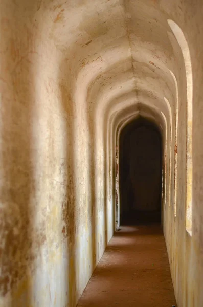 Arches and hallways of the Bhool Bhuliya maze that leads to the roof of the complex in Bara Imambara, Lucknow, Utter Pradesh, India. This amazing architecture marvel prevents anyone without a guide from reaching the palace roof