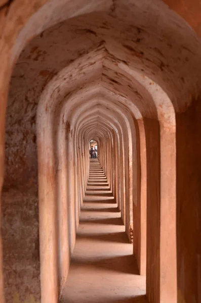 Arches and hallways of the Bhool Bhuliya maze that leads to the roof of the complex in Lucknow, Uttar Pradesh, India. This amazing architecture marvel prevents anyone without a guide from reaching the palace roof.