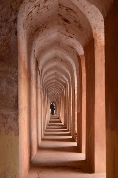 Arches and hallways of the Bhool Bhuliya maze that leads to the roof of the complex in Lucknow, Uttar Pradesh, India. This amazing architecture marvel prevents anyone without a guide from reaching the palace roof.