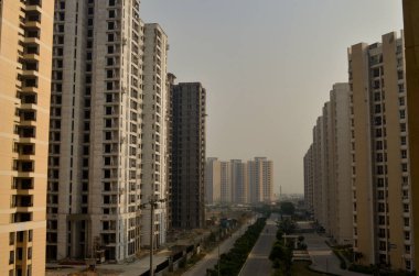 Satır modern yaşam toplum lüks toplum, yüksek doğmak, çok katlı konut daire binanın Delhi Ncr, Mumbai, Pune, Hyderabad, Lucknow, Jaipur, Kalküta, Noida, Gurgaon, Chennai, Bangalore
