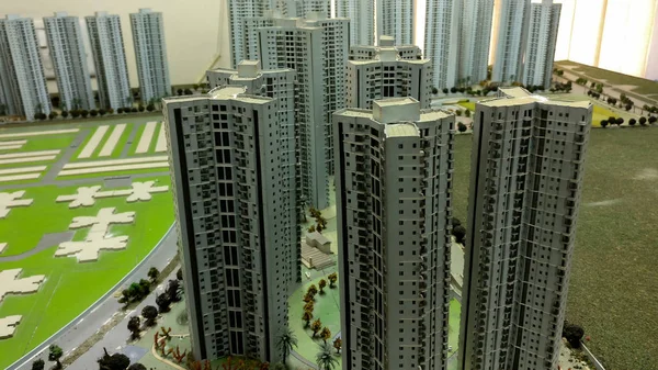 Models of the residential complex to be built at a real estate office in Delhi NCR, India