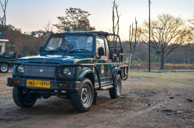 Uttarakhand, India, 2019. Emphatic maruti gypsy car offroading vehicle standing in Jim Corbett National Park tiger reserve