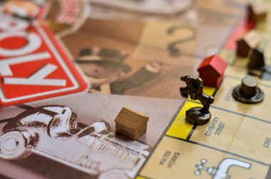 metal horse game piece on a board game