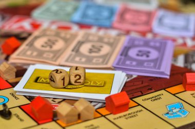 dice on monopoly cards