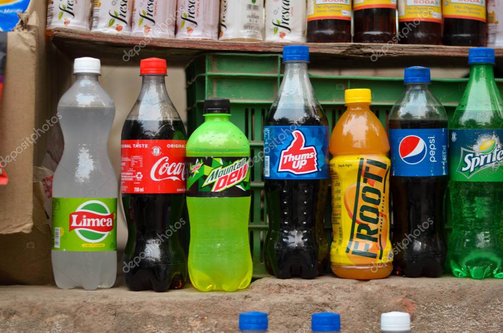 Cold drink brands kept for display at a roadside vendor shop during summers. Soft drink sales go up during this season global companies like Pepsi and Coca Cola