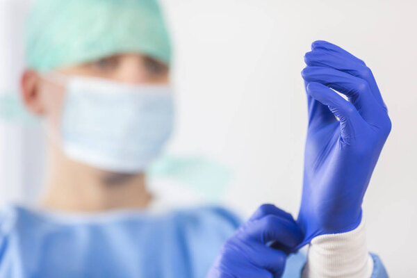 Working surgeon in a hospital operating room