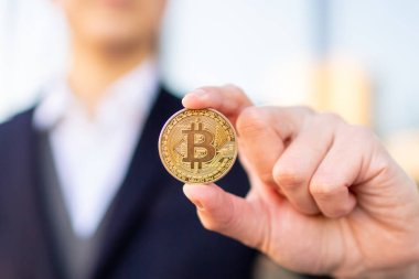 Bitcoin cryptocurrency tutan işadamı tüccar.