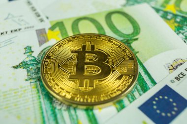 Kripto para birimi kavramı - euro faturaları bir bitcoin