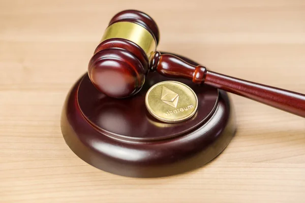 Ethereum Regulation. ETH crypto coin and gavel on a desk. — Stock Photo, Image