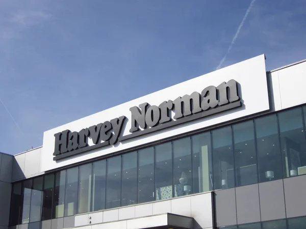 Cartel de Harvey Norman en un edificio — Foto de Stock