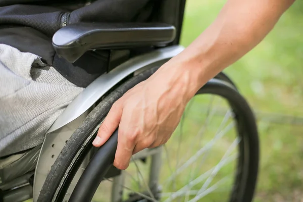 Disabled man on wheelchair in nature — Stock Photo, Image
