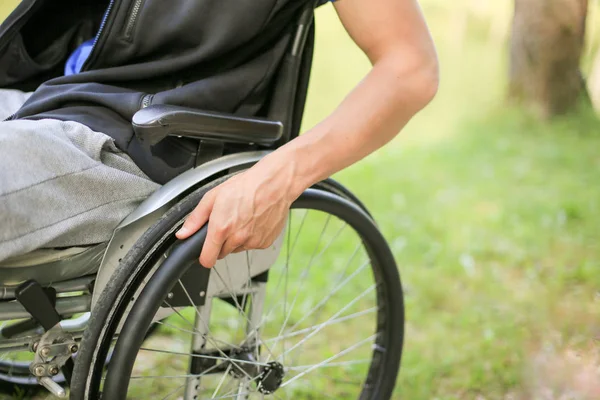 Disabled man on wheelchair in nature — Stock Photo, Image