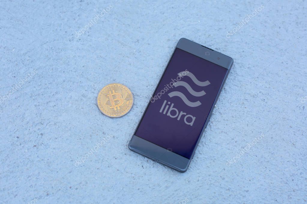 20 June 2019, Ljubljana Slovenia - Libra app logo on a smartphone, new global crypto currency developed by facebook with bitcoin