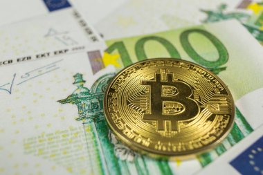 Kripto para birimi kavramı - euro faturaları bir bitcoin