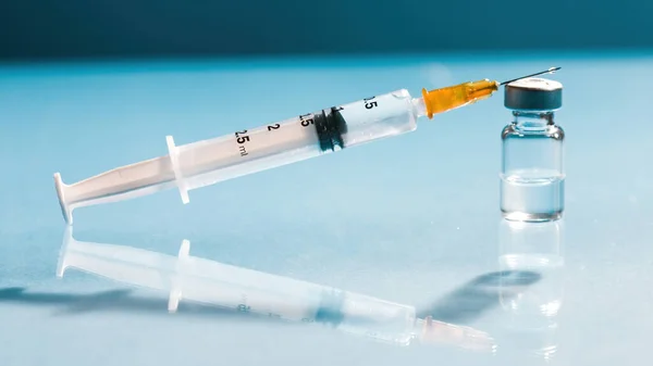 Vaccine with syringe