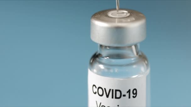 Coronavirus vaccine with syringe — Stock Video