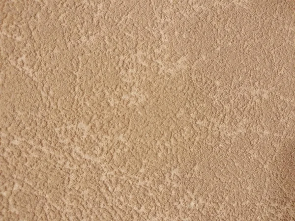 Beige decorative plaster. The texture of the plaster bark beetle. Abstract rough background. — Stock Photo, Image