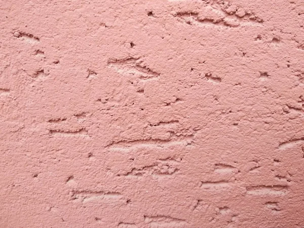 Pink decorative plaster. The texture of the plaster bark beetle. Abstract rough background. — Stock Photo, Image