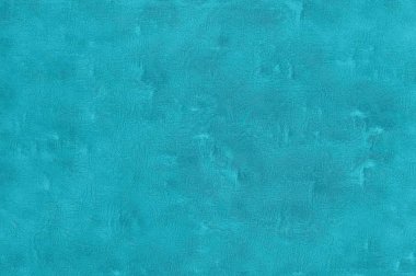 Eski bir çizik mavi duvar turkuaz yansımaları ile çatlamış doku