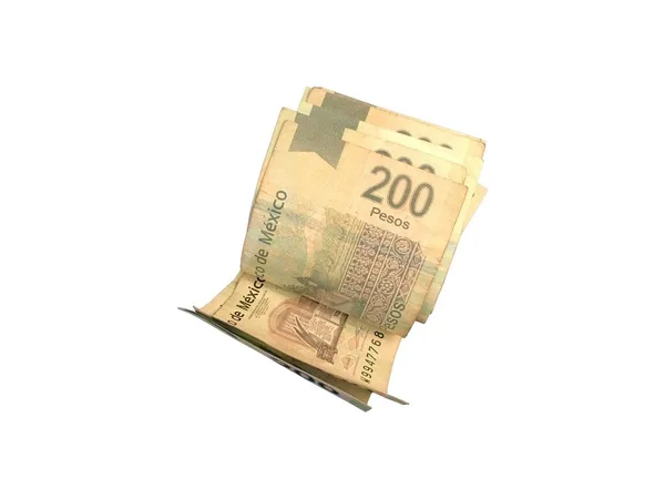Některé Mexické peso 200 papírových účtů seskupeny a izolované na bílém pozadí — Stock fotografie