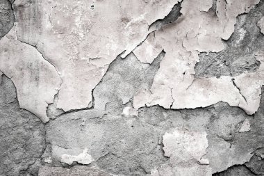 Çürüyen ve alçıdan düşmüş eski duvarın parçası