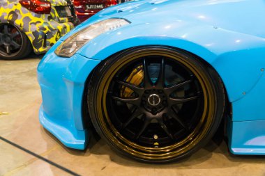 KUALA LUMPUR, MALAYSIA - JULY 28, 2018: Close-up of Rims and tyre from Nissan Fairlady 350z at Festival Art of Speed in Kuala Lumpur, Malaysia clipart
