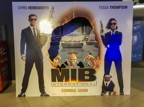 Cartaz do filme Men in Black International. Este filme é um filme americano de comédia de ação de ficção científica dirigido por F. Gary Gray — Fotografia de Stock