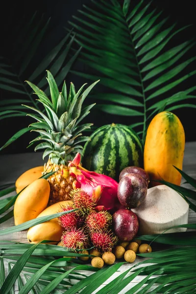 Set of exotic fruits. Assorted tropical fruits of pineapple, rambutan, passion fruit, mango, dragon fruit, longan, coconut, watermelon