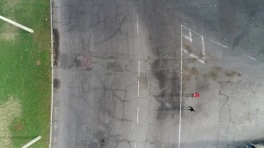 Shooting running along the road athletes in the half marathon in Zaporizhia from top to bottom