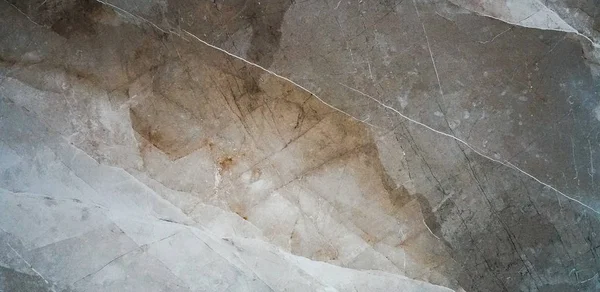 Büyük bir taş döşemenin katında doğal taş (granit, mermer) dokusu
