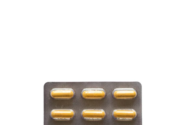 Κίτρινα Χάπια Μια Φουσκάλα Ένα Απλό Φόντο — Φωτογραφία Αρχείου