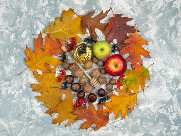 Flat lay autumn composition. Circle frame made of autumn leaves,