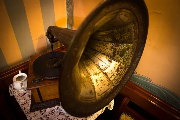 You hear the music from the old gramophone.