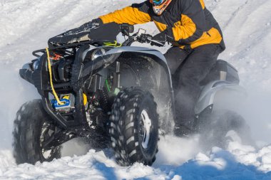 front wheel of Quad bike in the snow