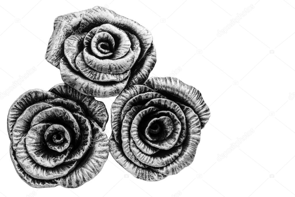 Flowers made of metal on white background