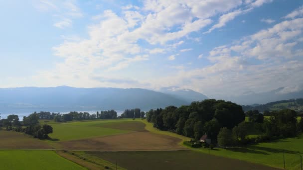 スイスのフォン ホルツュステルンゴルフ場でのツーク湖とリグのエリアショット — ストック動画