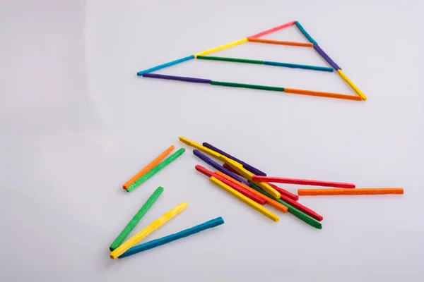 Triangle Made Bunch Colorful Sticks — Stock Photo, Image