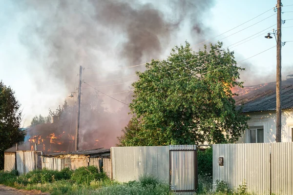 Flames from a burning house, a strong terrible fire