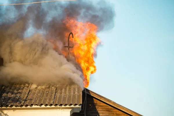 stock image Flames from a burning house, a strong terrible fire