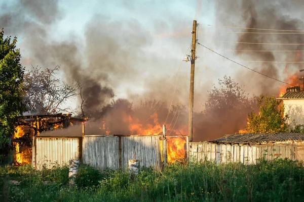 Flames from a burning house, a strong terrible fire