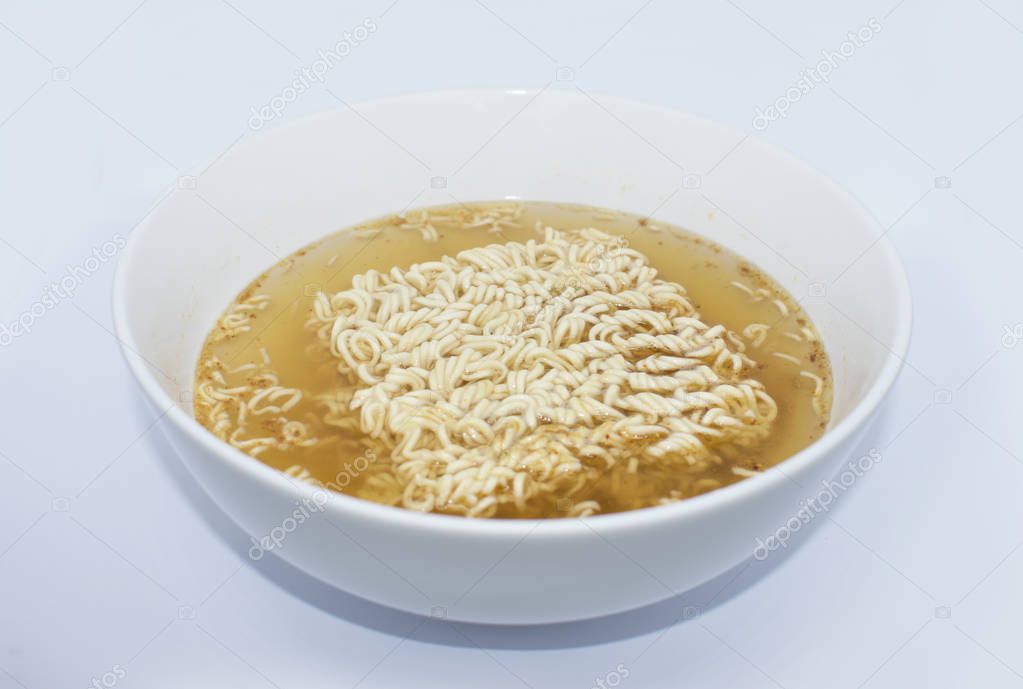 instant noodles in bowl on white background