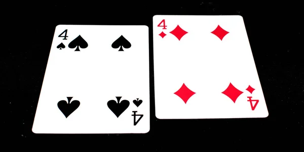 playing cards on black background - game tool